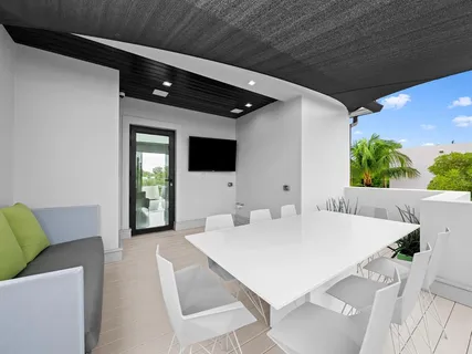 a bathroom with a sink toilet a mirror and shower