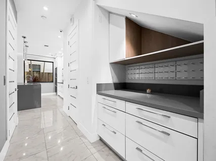 a spacious bathroom with a shower and a sink