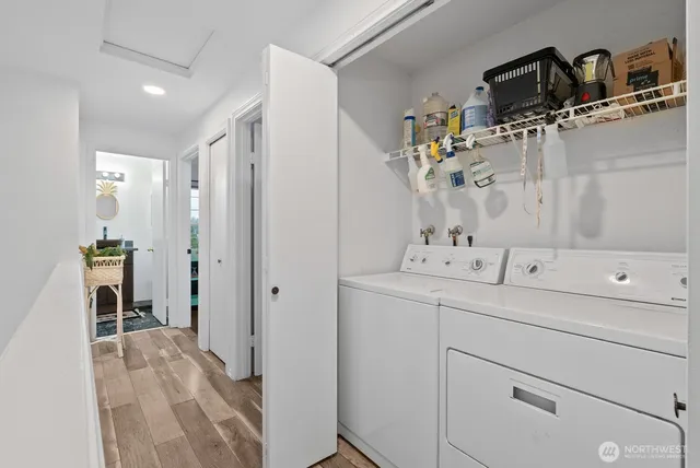 a bathroom with a sink a mirror and shower