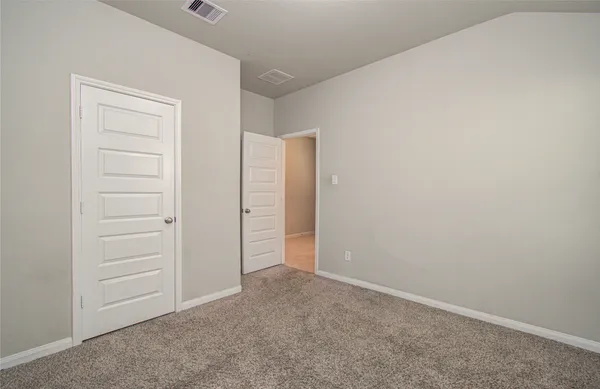 an empty room with an entryway