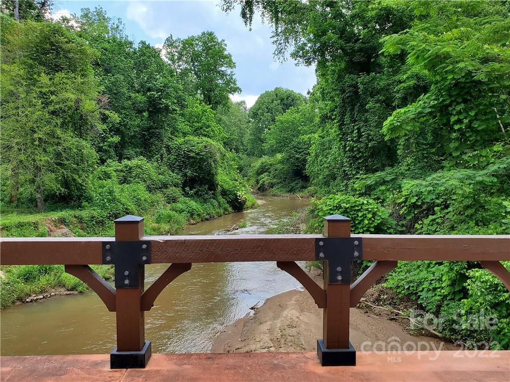 a park view with a bench in the background