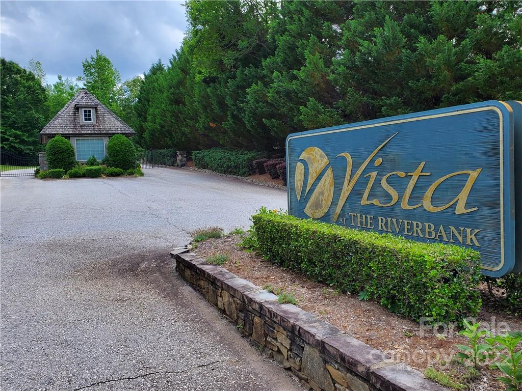 7 West Rambling Creek Drive Tryon, NC 28782 - Photo 15 of 15 a sign that is on the side of the road