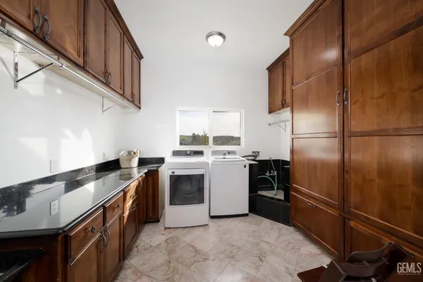 a kitchen with a refrigerator stove and oven