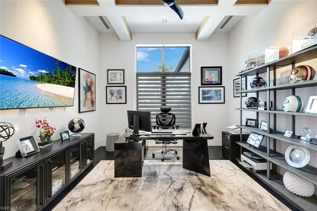 a kitchen with stainless steel appliances kitchen island granite countertop a stove a sink and a microwave