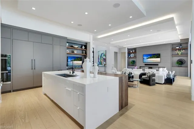 a view of living room with furniture and a flat screen tv