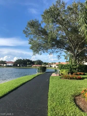 an aerial view of a garden with houses