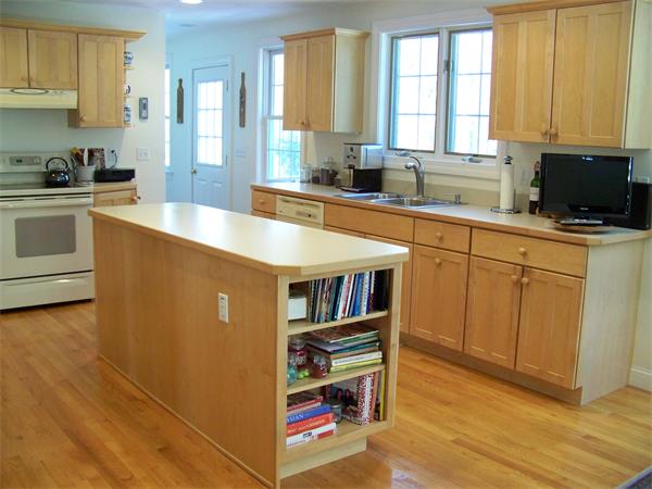 75 Nixon Road Framingham, MA 01701 - Photo 4 of 26 a kitchen with stainless steel appliances granite countertop a stove a sink and a microwave