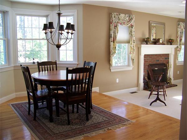 75 Nixon Road Framingham, MA 01701 - Photo 5 of 26 a view of a dining room with furniture window and wooden floor