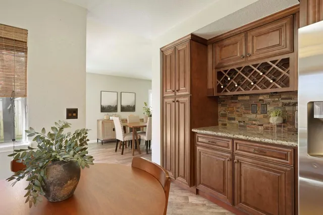 a view of a living room and hardwood floor