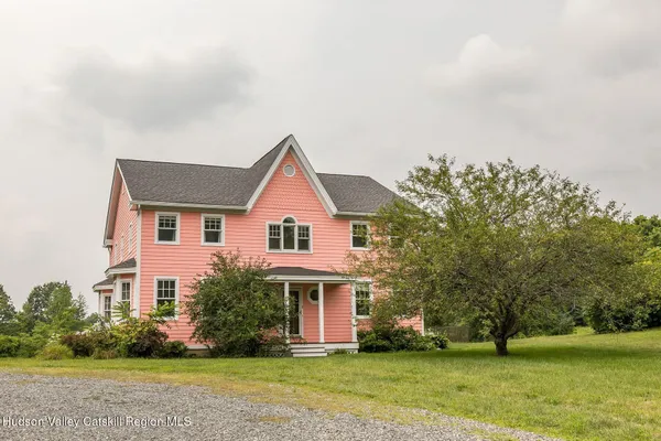 a front view of house with yard