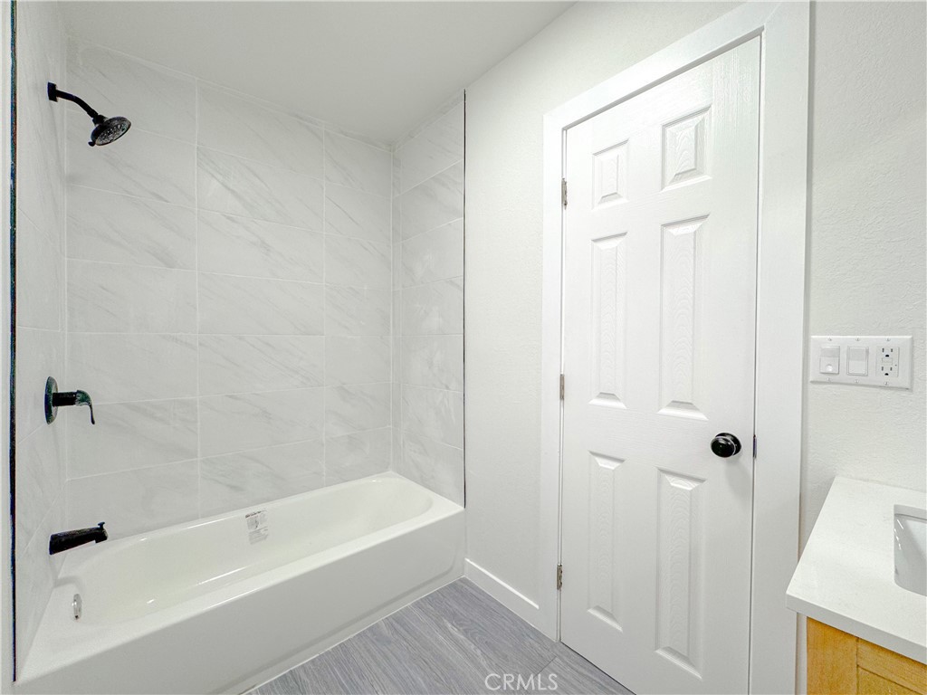 1366 West 152nd Street Compton, CA 90220 - Photo 12 of 30 a bathroom with a bathtub