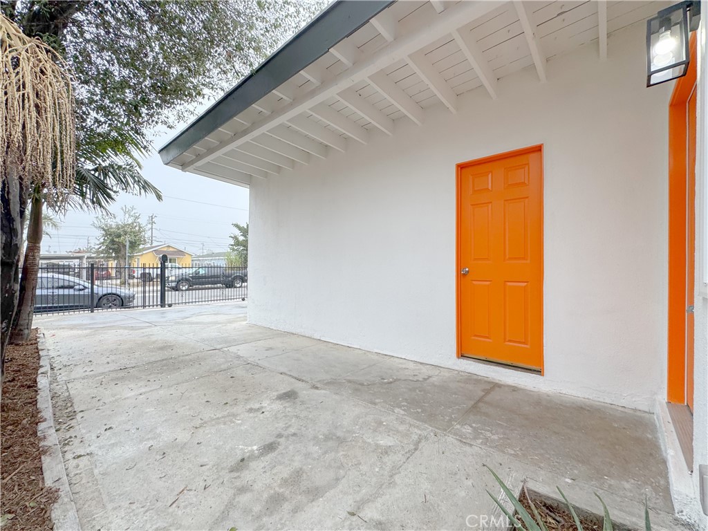 1366 West 152nd Street Compton, CA 90220 - Photo 28 of 30 a view of a room with a patio and a fire pit