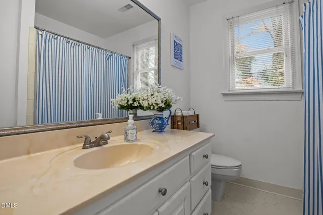 $720,000 | 203 Piperwood Drive, Cary, NC 27518