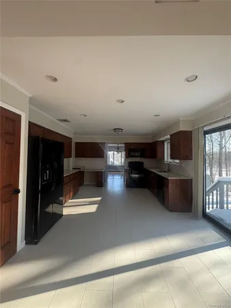 a view of a livingroom with furniture