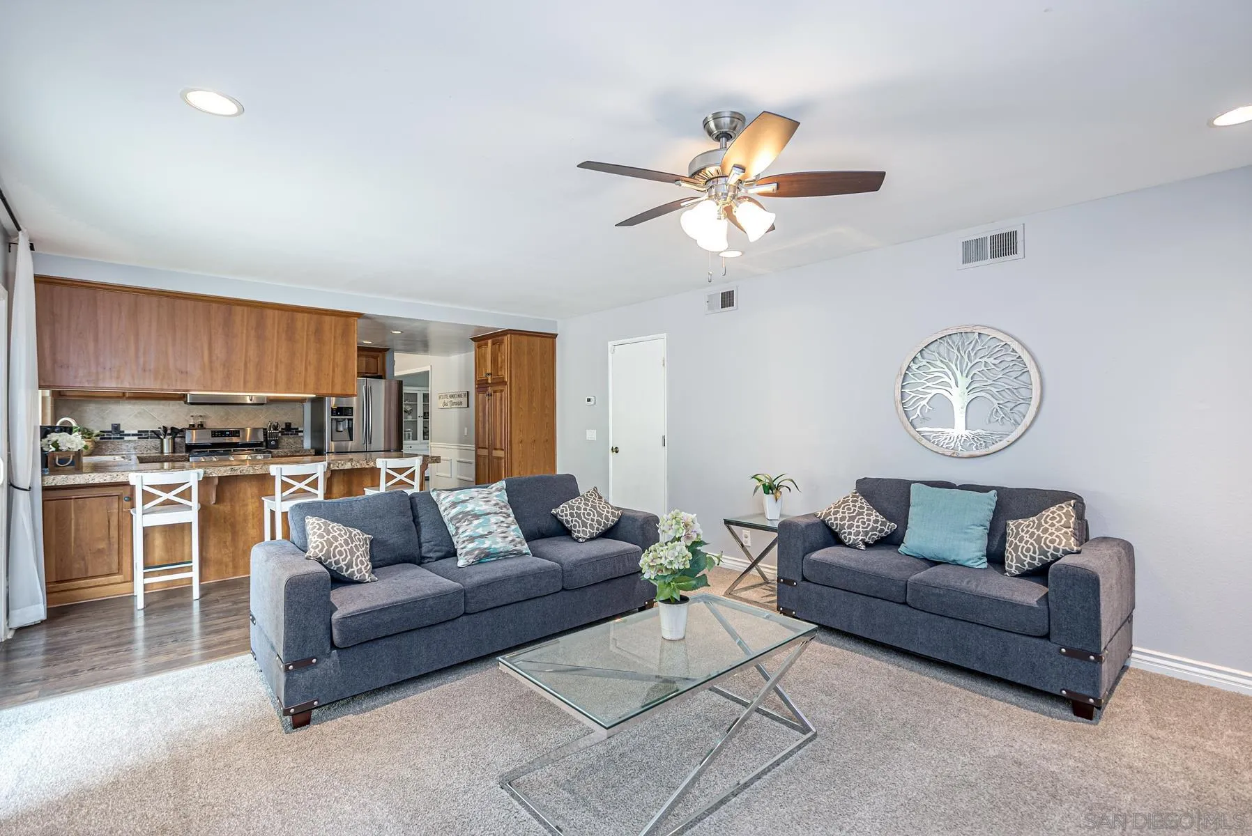 10046 Fieldcrest Street Spring Valley, CA 91977 - Photo 9 of 42 a living room with furniture kitchen view and a window