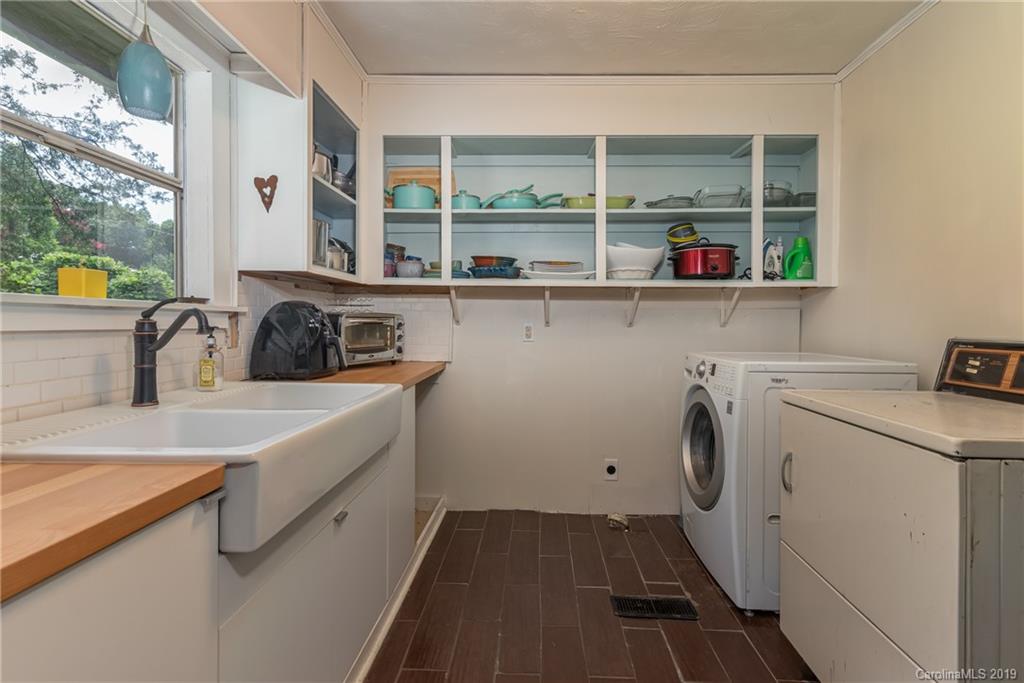 265 Carson Street Tryon, NC 28782 - Photo 12 of 28 a utility room with dryer and washer