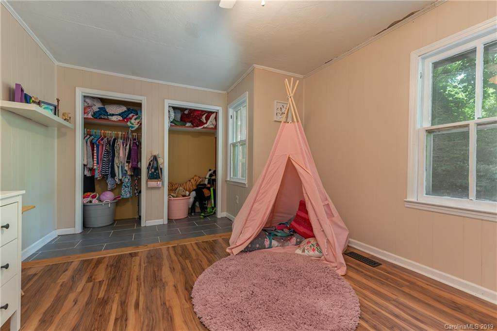 265 Carson Street Tryon, NC 28782 - Photo 17 of 28 a view of a livingroom with furniture and wooden floor