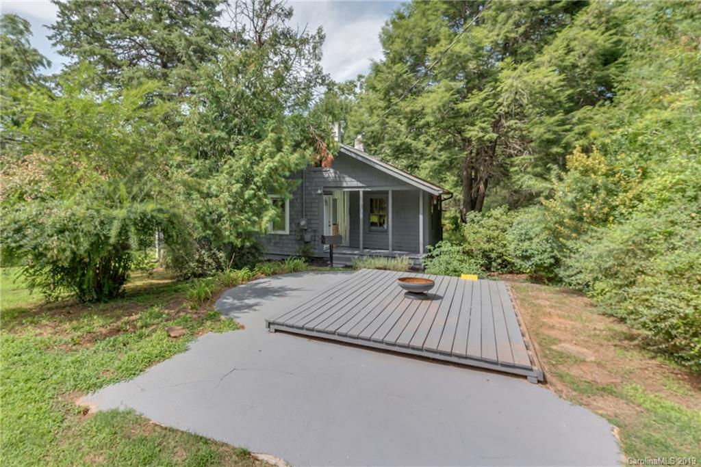 265 Carson Street Tryon, NC 28782 - Photo 23 of 28 a view of backyard with green space