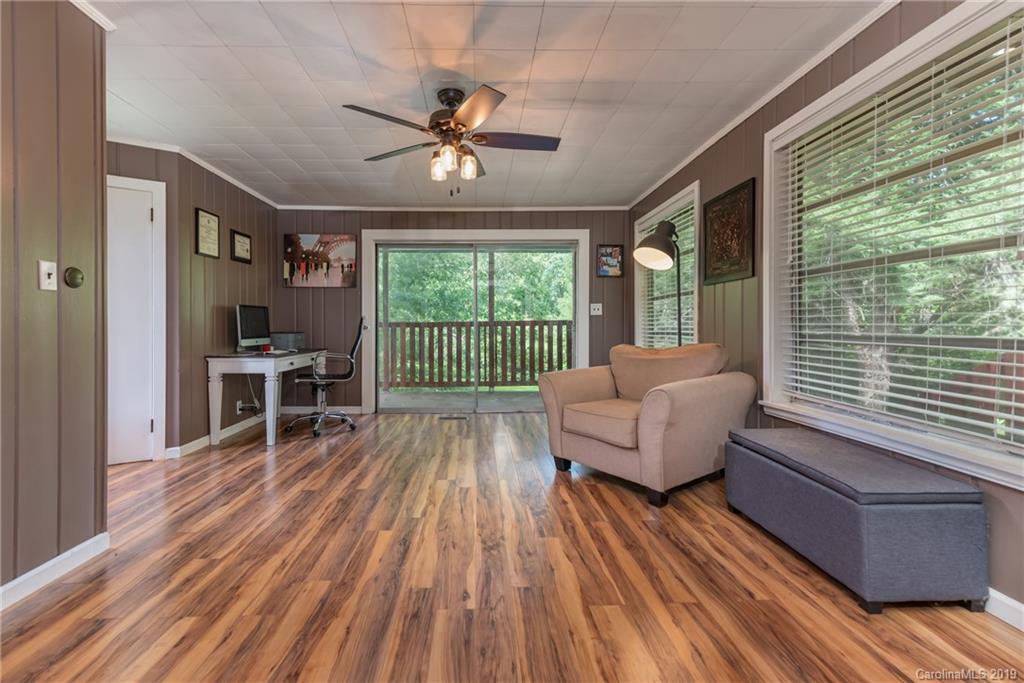 265 Carson Street Tryon, NC 28782 - Photo 8 of 28 a living room with furniture and a large window