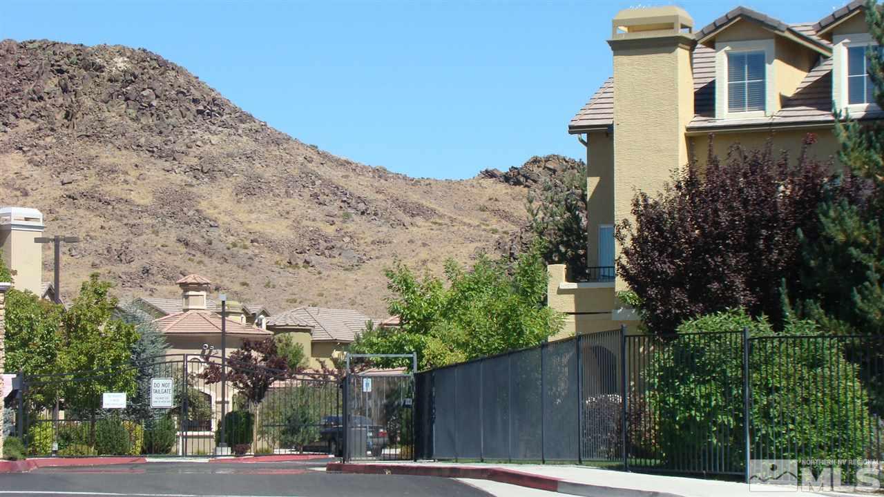 9050 Double R Boulevard, Unit 123 Reno, NV 89521 - Photo 1 of 1 a view of a street with a building in the background