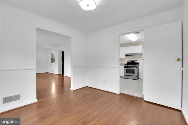 a view of a livingroom with wooden floor