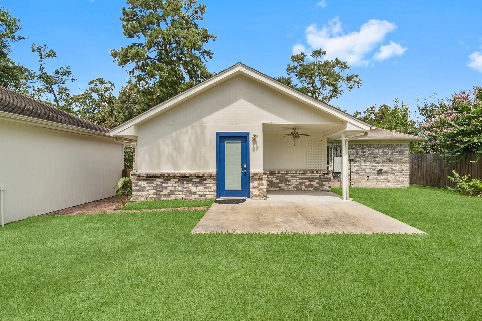 27234 Wells Lane Conroe, TX 77385 - Photo 14 of 15 a front view of house with yard and green space