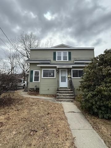 10 Idalla Avenue Worcester, MA 01606 - Photo 1 of 6 a front view of a house with a yard