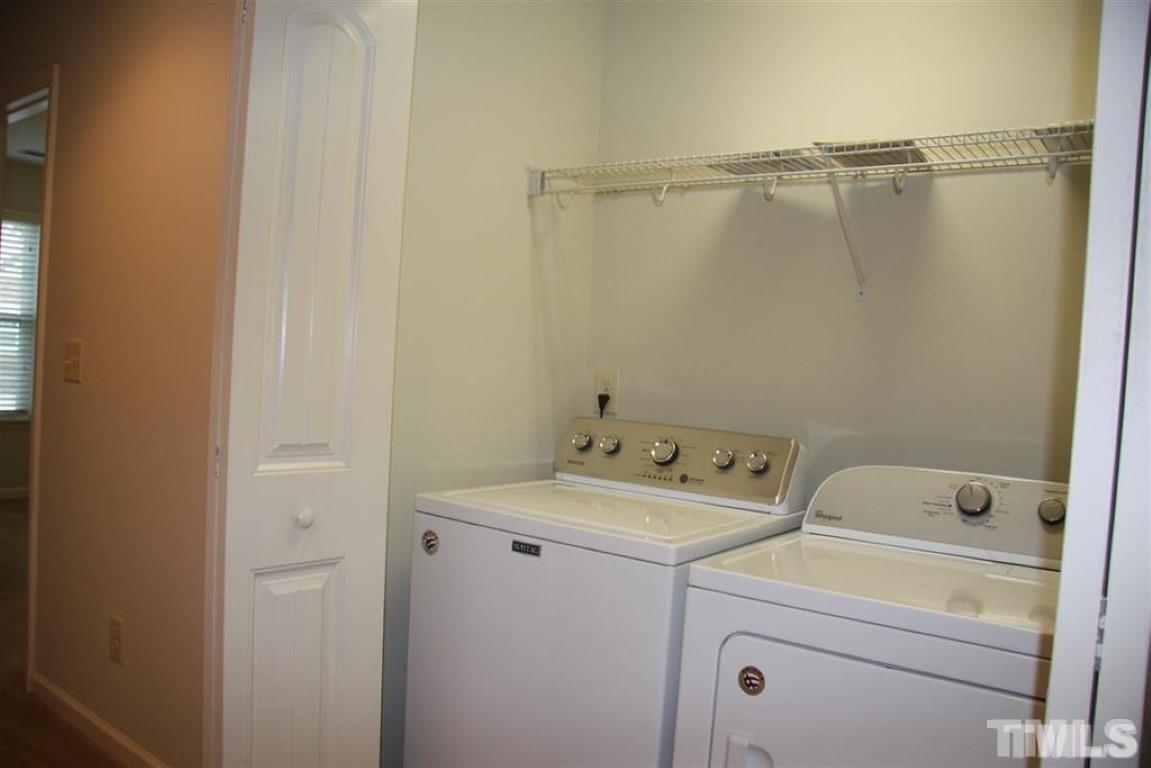 139 Skyros Loop Cary, NC 27519 - Photo 18 of 30 a utility room with dryer and washer