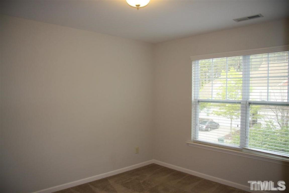 139 Skyros Loop Cary, NC 27519 - Photo 22 of 30 an empty room with a window