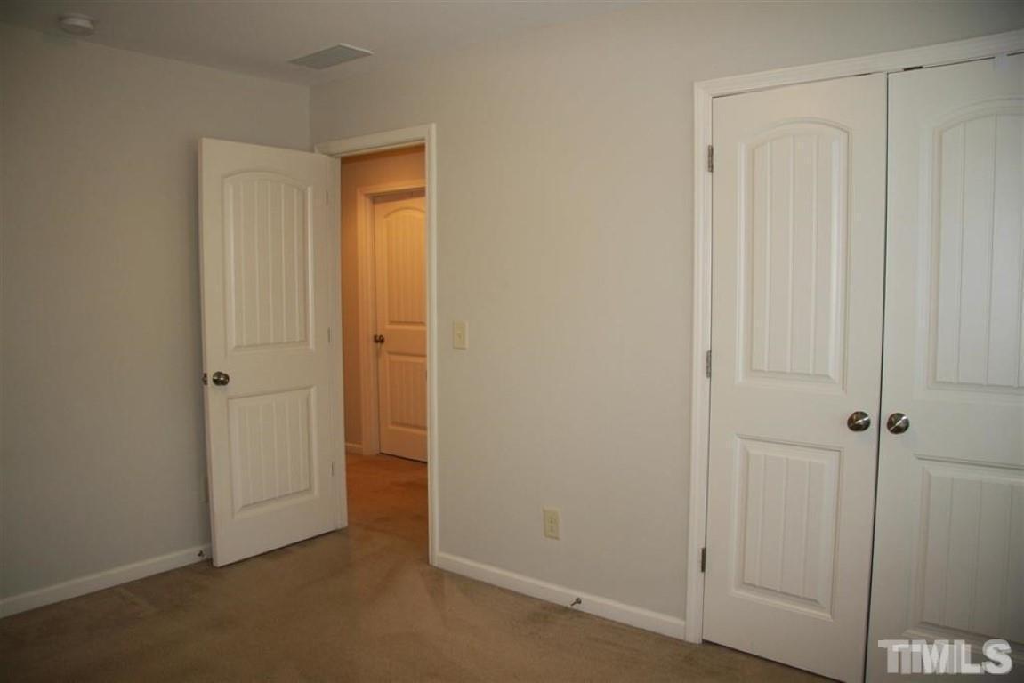 139 Skyros Loop Cary, NC 27519 - Photo 25 of 30 an empty room with closet area