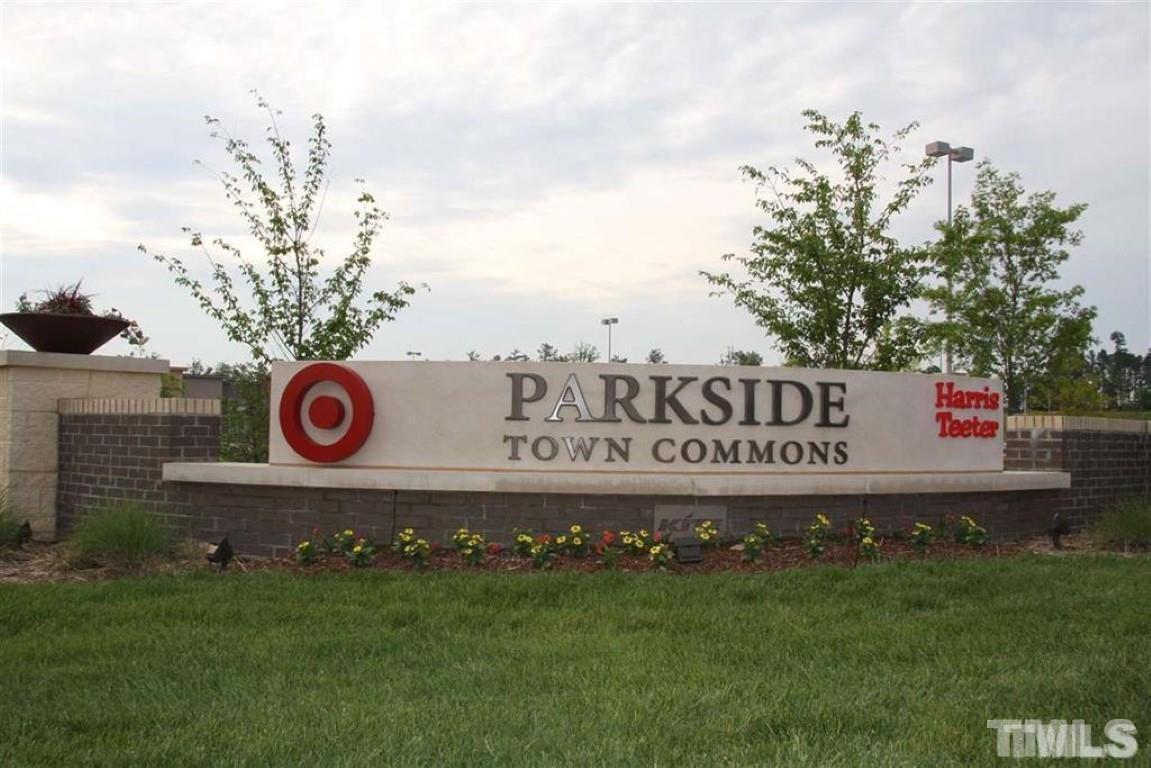 139 Skyros Loop Cary, NC 27519 - Photo 30 of 30 a street sign that is sitting on a wooden wall