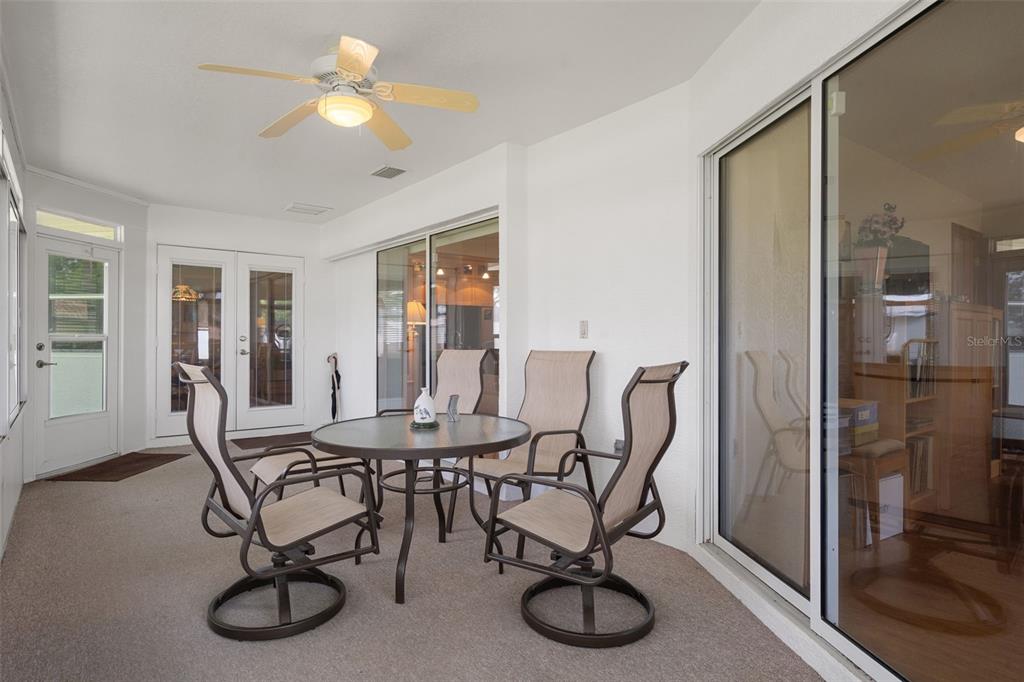 5035 Harbinger Road Spring Hill, FL 34608 - Photo 44 of 47 a view of a dining room with furniture