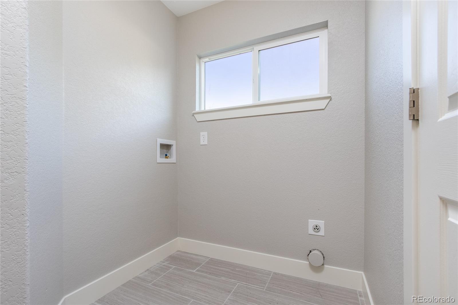 1589 Spring Water Way Highlands Ranch, CO 80129 - Photo 26 of 40 a small space with a window