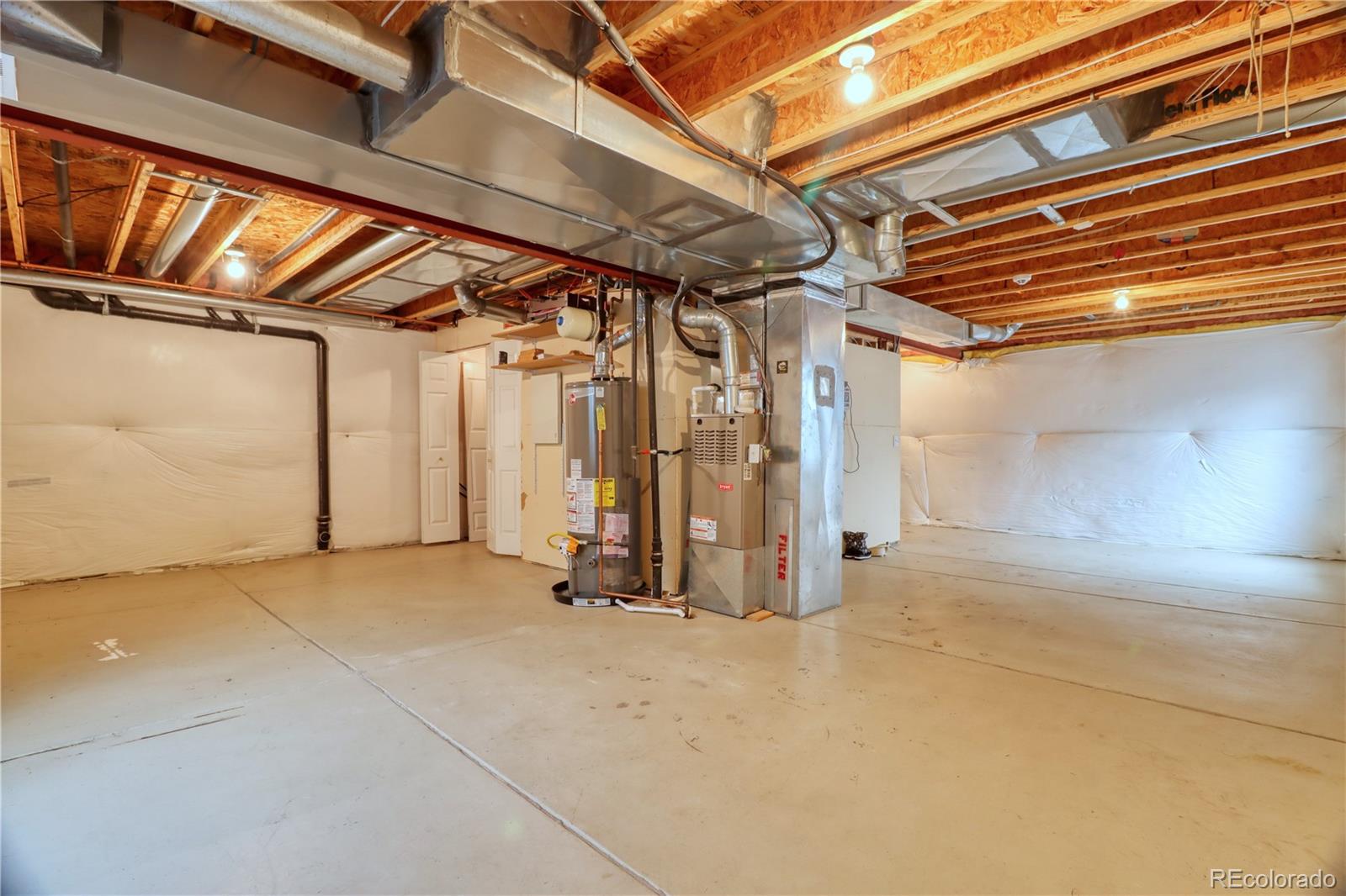 3819 South Rome Way Aurora, CO 80018 - Photo 11 of 25 a view of an empty room