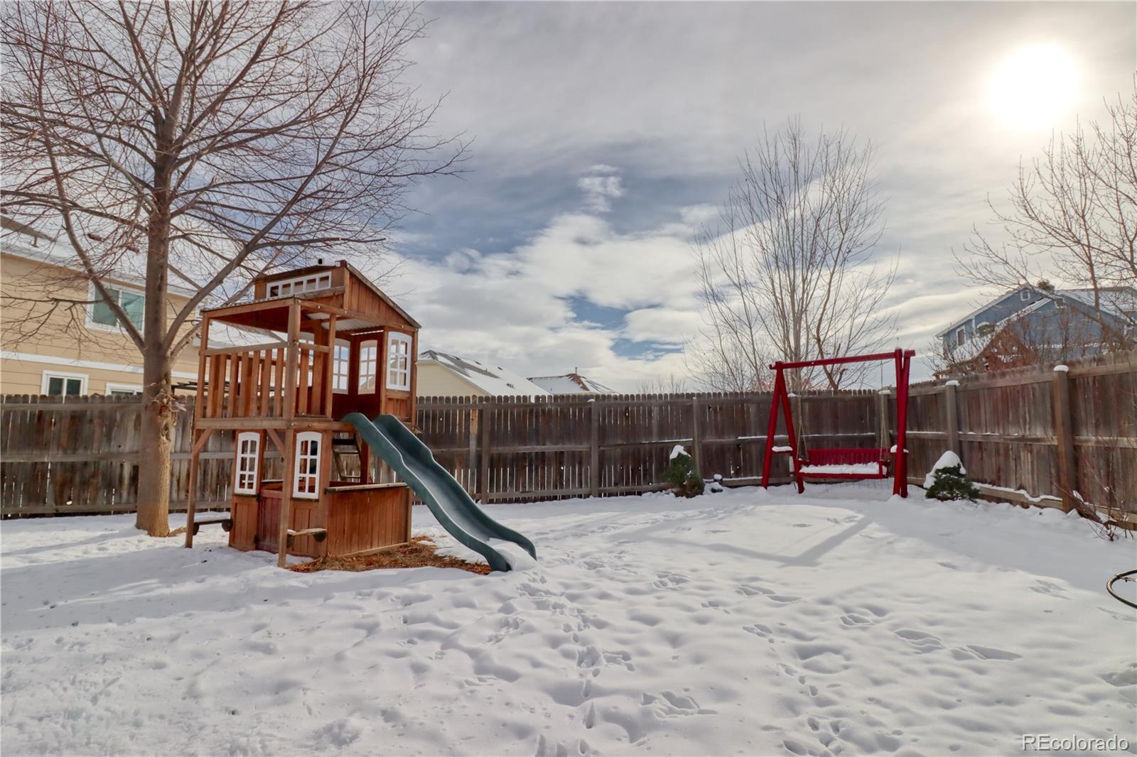 3819 South Rome Way Aurora, CO 80018 - Photo 25 of 25 a view of a park with large trees