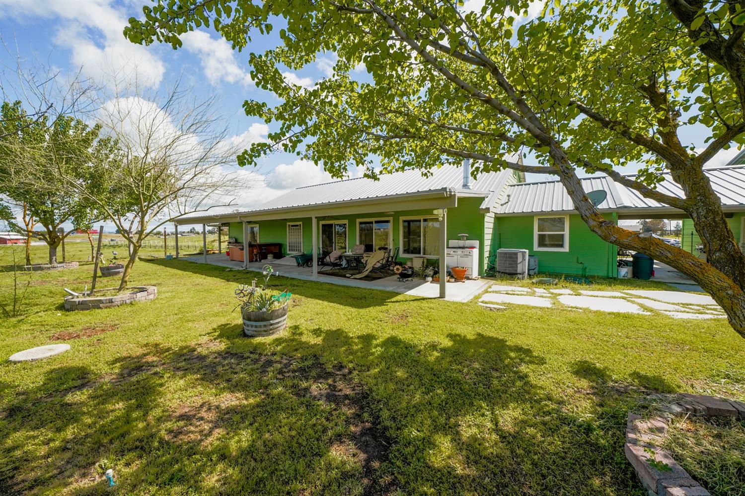 37491 Verde Avenue Madera, CA 93636 - Photo 29 of 66 a view of swimming pool with trees and plants