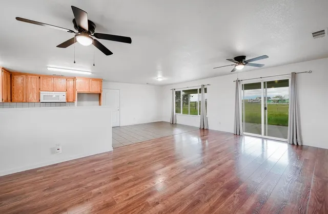 a view of a lake with a house in the background