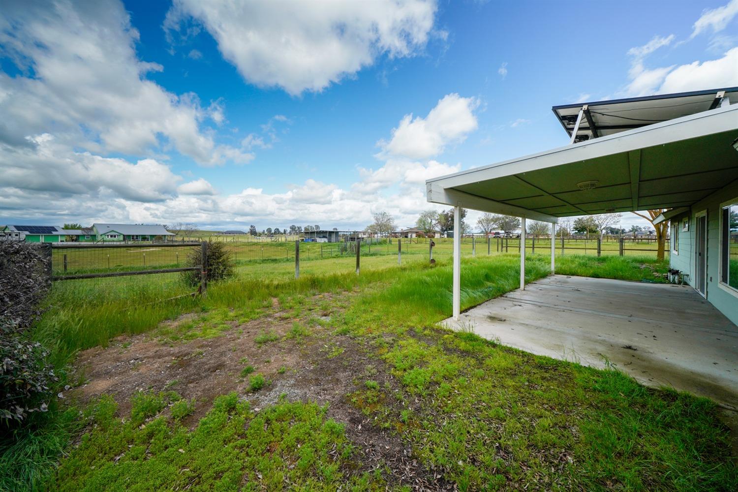 37491 Verde Avenue Madera, CA 93636 - Photo 46 of 66 a view of a garden with sitting area