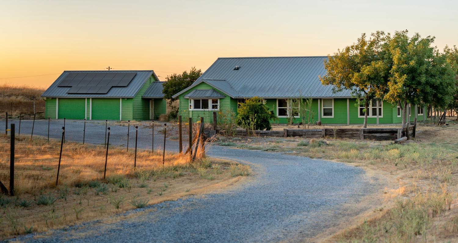 37491 Verde Avenue Madera, CA 93636 - Photo 58 of 66 a view of a yard in front of a house