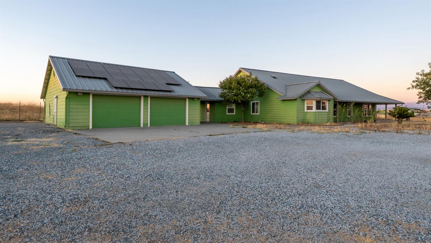37491 Verde Avenue Madera, CA 93636 - Photo 63 of 66 a house view with a garden space