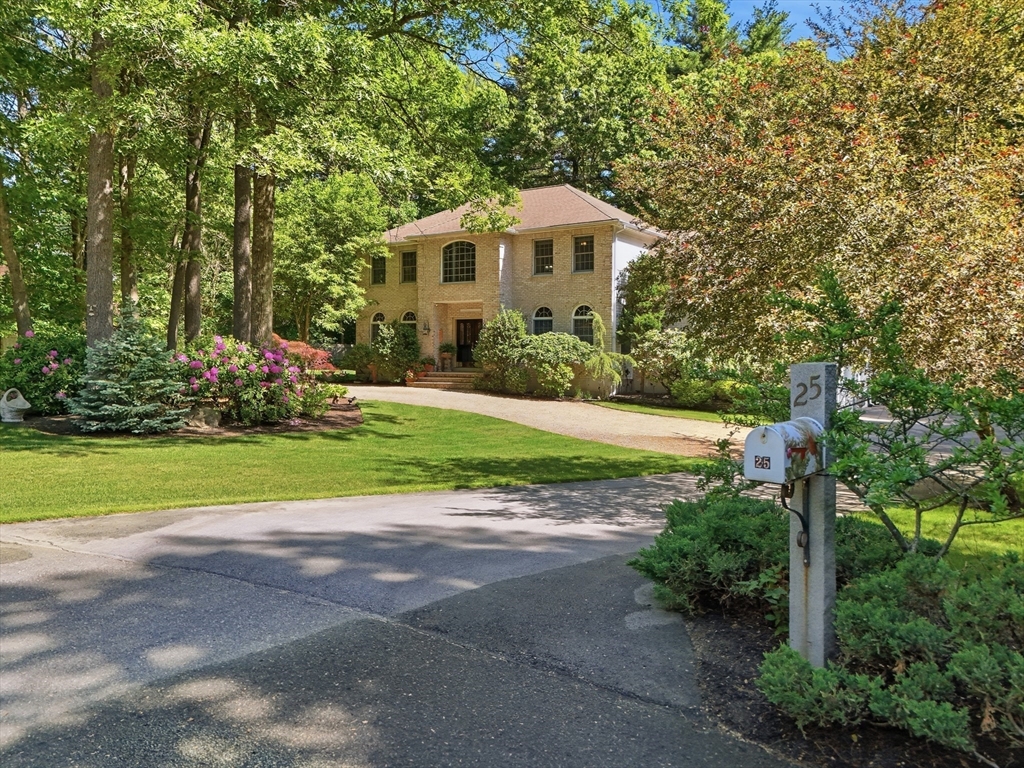 25 Haymeadow Road Boxford, MA 01921 - Photo 3 of 42 a front view of a house with yard and green space