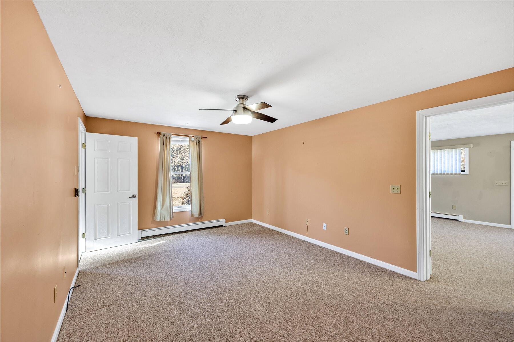 171 Currier Road East Falmouth, MA 02536 - Photo 20 of 47 a view of an empty room with a window