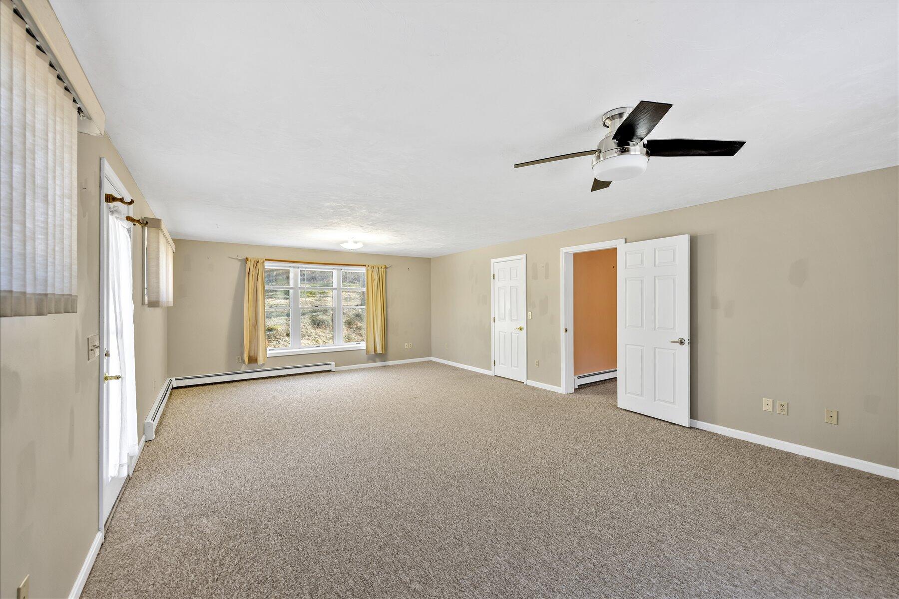 171 Currier Road East Falmouth, MA 02536 - Photo 23 of 47 a view of an empty room with a window