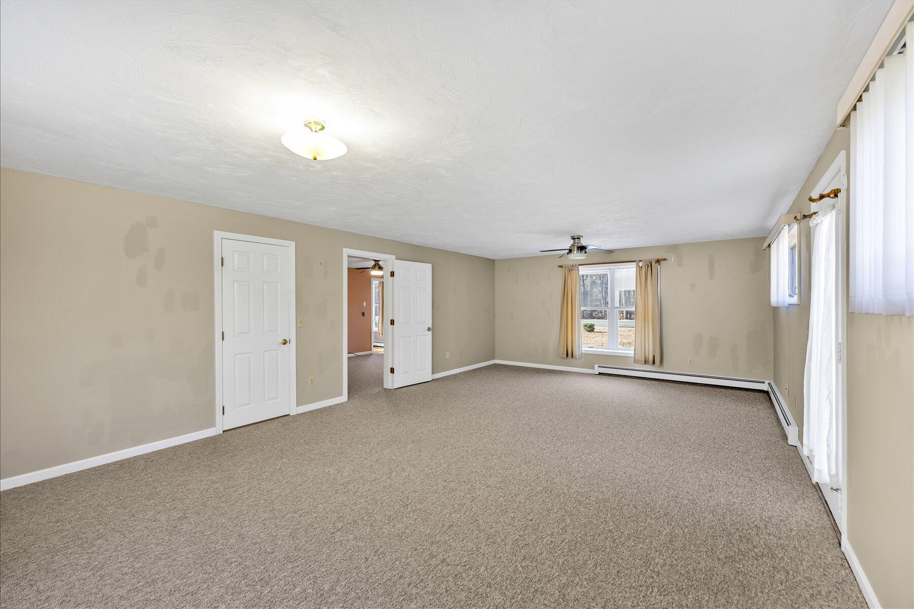 171 Currier Road East Falmouth, MA 02536 - Photo 24 of 47 a view of an empty room with a window