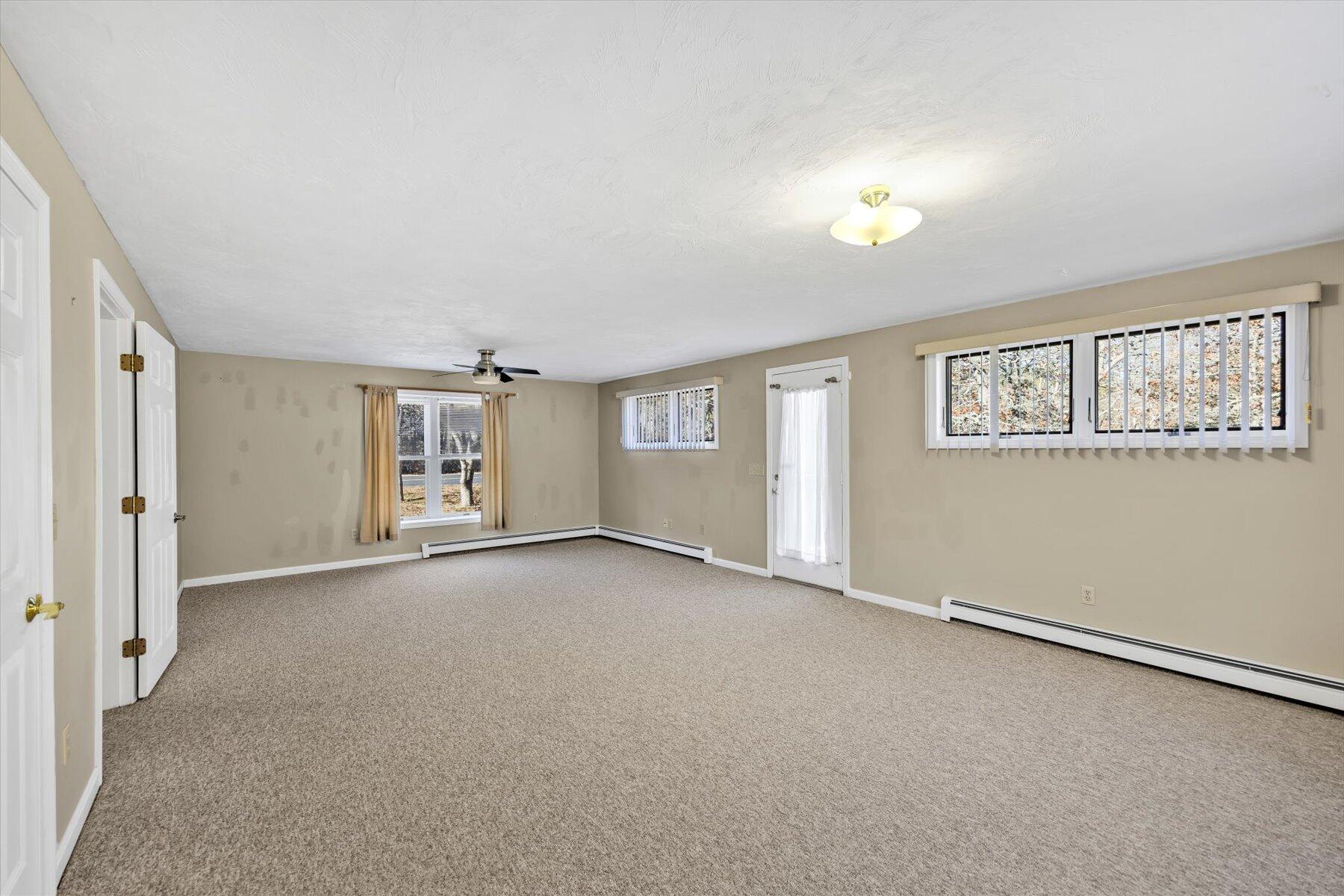 171 Currier Road East Falmouth, MA 02536 - Photo 25 of 47 an empty room with windows and closet