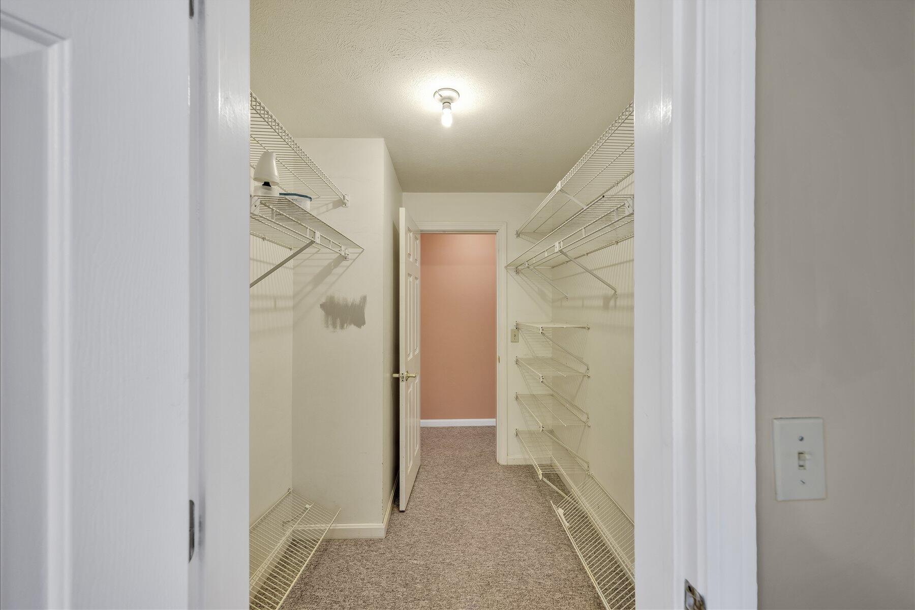 171 Currier Road East Falmouth, MA 02536 - Photo 26 of 47 a bathroom with a shower and a glass door