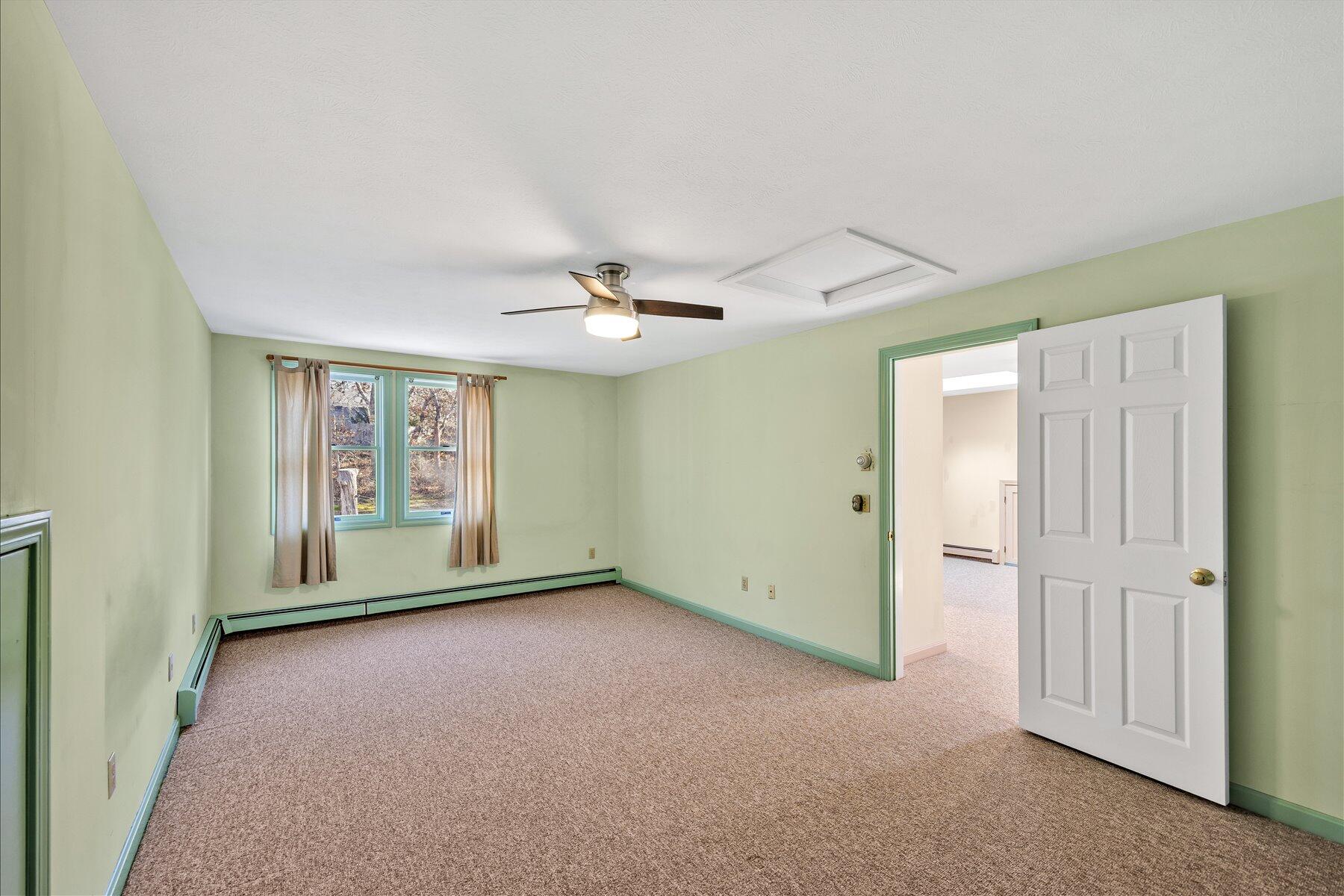 171 Currier Road East Falmouth, MA 02536 - Photo 29 of 47 a view of an empty room with a window