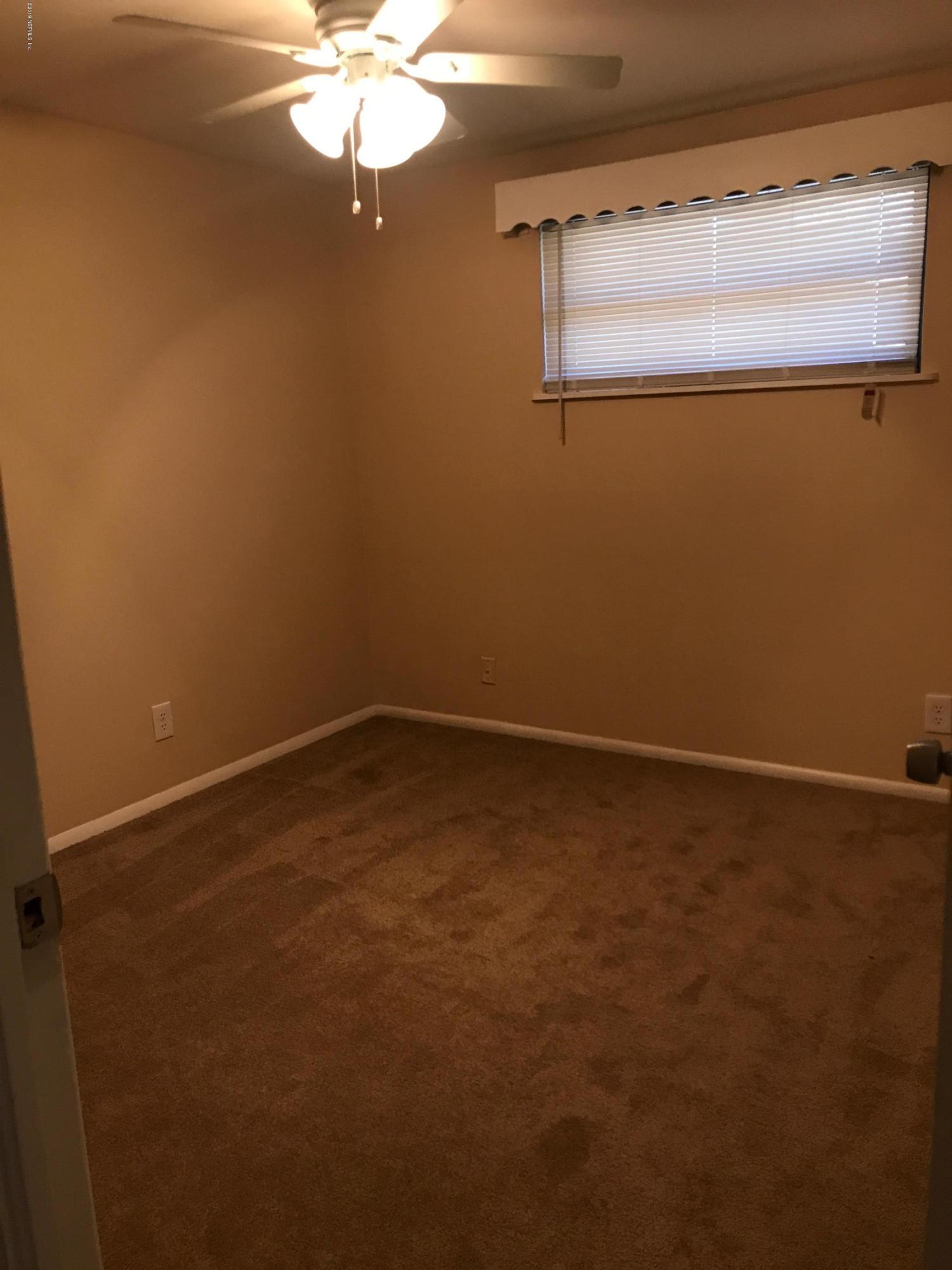 5626 Ricker Road Jacksonville, FL 32244 - Photo 14 of 25 a view of small space with a window