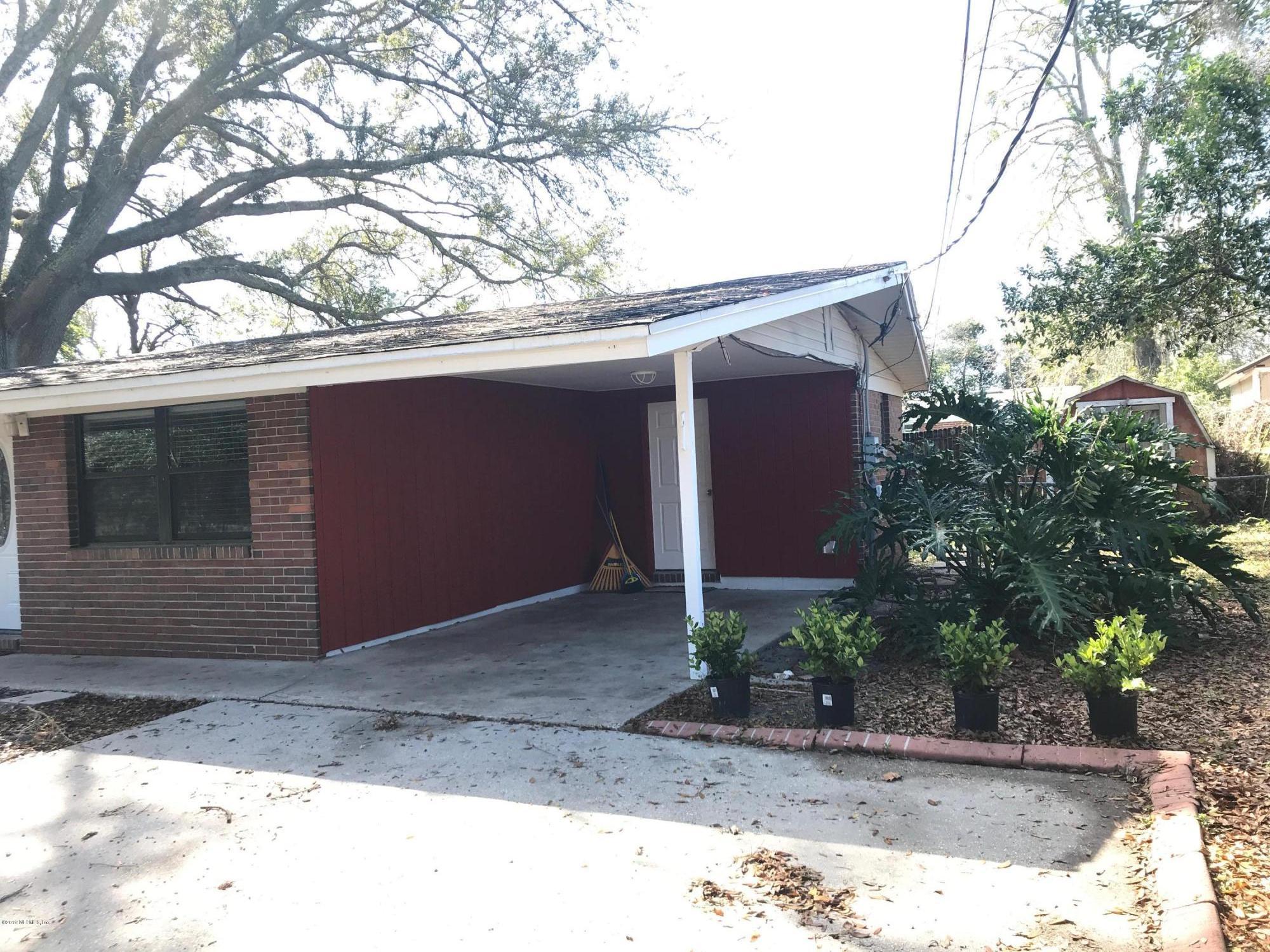 5626 Ricker Road Jacksonville, FL 32244 - Photo 3 of 25 a house view with a outdoor space