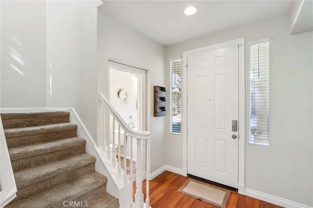 a view of entryway with wooden floor
